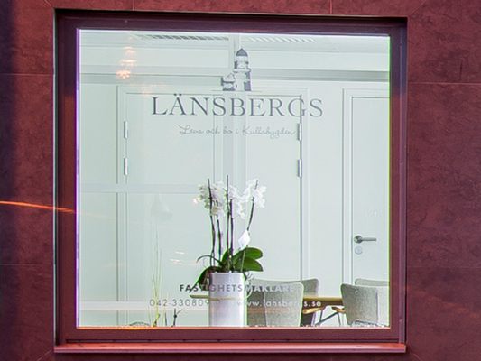 Självhäftande logotyp