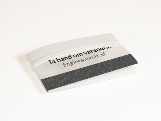 Munskydd egen logotyp på förpackning